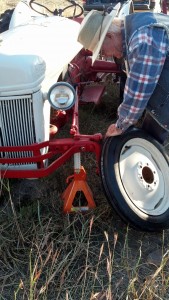 Bob changing another tire on Tilly. With all of the brush and thorns, we were going through tube pretty good.
